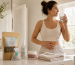 Woman practising healthy hydration and bathroom habits to help prevent recurrent urinary tract infections